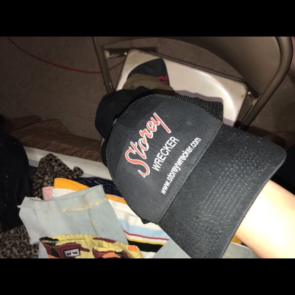 black “storey wrecker” hat